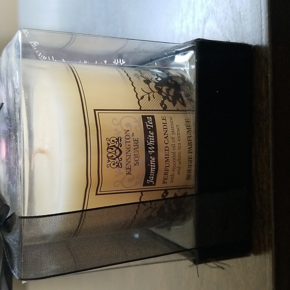 BRAND new jasmine white tea candle